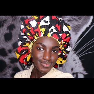 Reversible.African print bonnet with satin lining